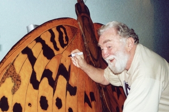 Image of David Bellamy signing BAP butterfly