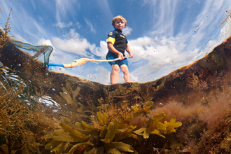 Image of boy rockpooling © Alex Mustard/2020VISION