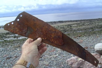 Large rusty saw blade