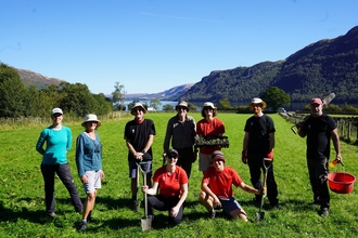 Image of volunteers ready to plant wildflower plug plants at Glencoyne near Penrith