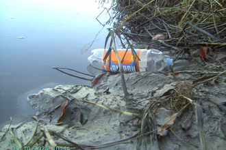 Washed up plastic bottle