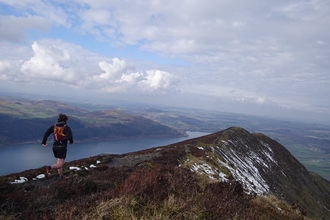 A fell runner on Carl side fell in Cumbria