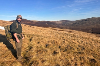 Image of Pete Jones Skiddaw Forest Project Manager with Skiddaw in the background