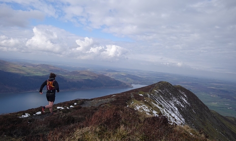 A fell runner on Carl side fell in Cumbria