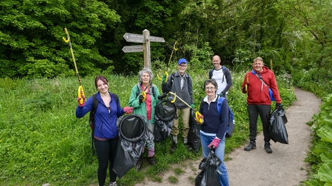 Image of ERT volunteers litter picking along the river in Carlisle credit Stuart Walker Photography