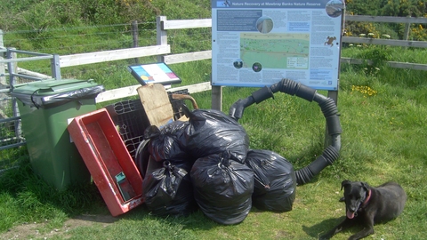 Loads of Rubbish piled on the beach