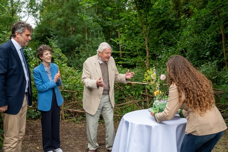 Image of David Attenborough receiving cake at Rothschild medal award