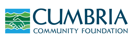 Logo of the Cumbria Community Foundation showing an image of hands holding formed from the landscape.