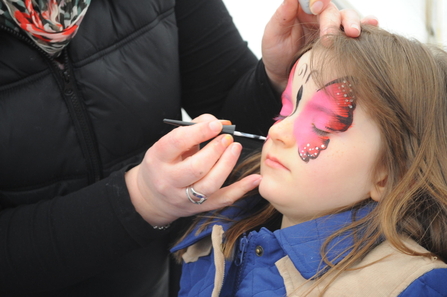 Facepainting a butterfly credit Amy Lewis